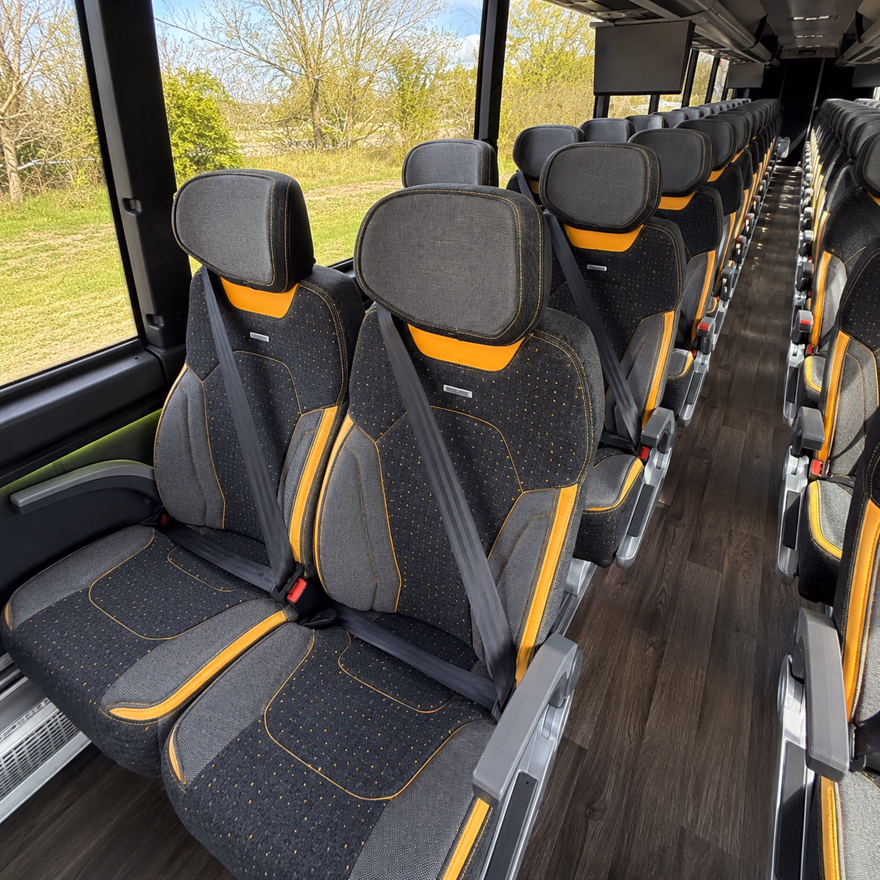 instead of five cars on i 85 one bus takes your group to greenville spartanburg and atlanta